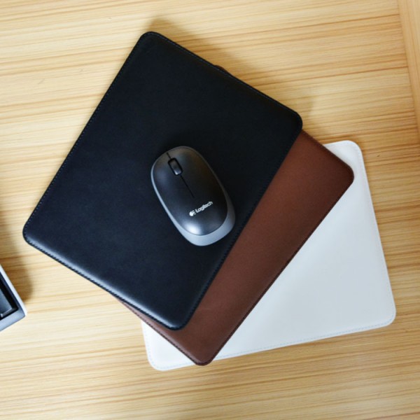The manufacturer directly provides customized accessories of mouse pad Pu two-layer leather logo pad graffiti mouse pad wholesale